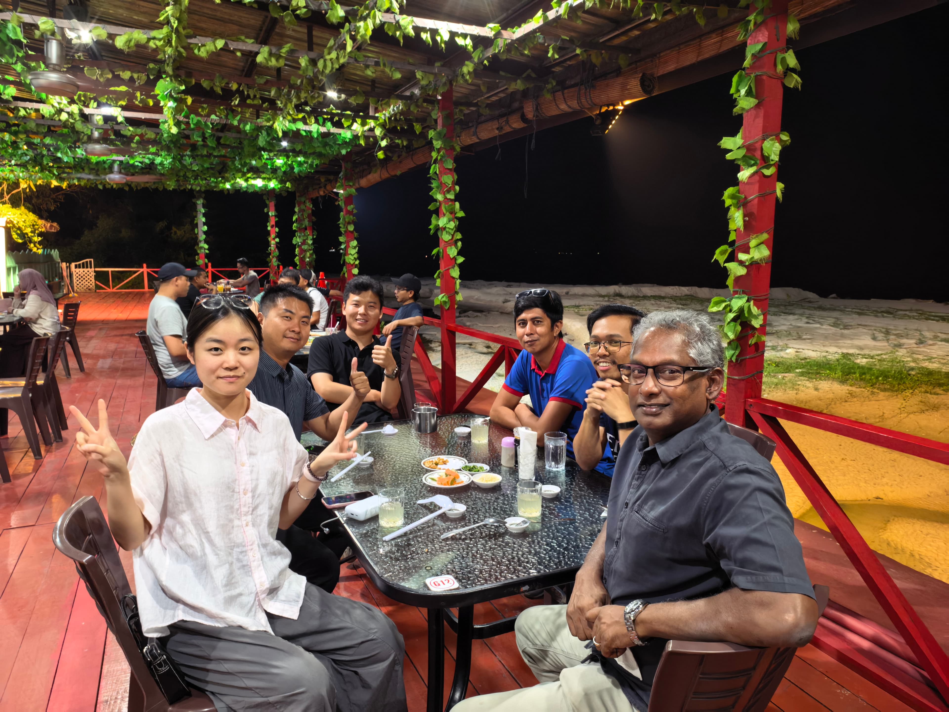 NetJoin team sharing a meal after a field visit