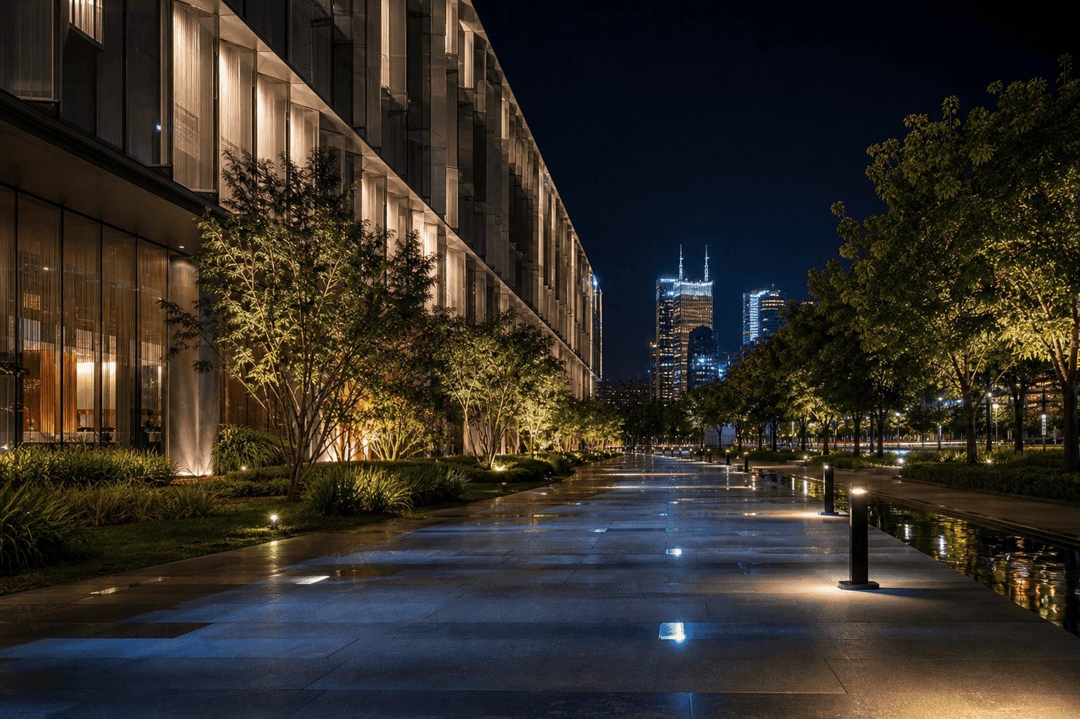 Landscape and facade lighting in an urban commercial complex at night